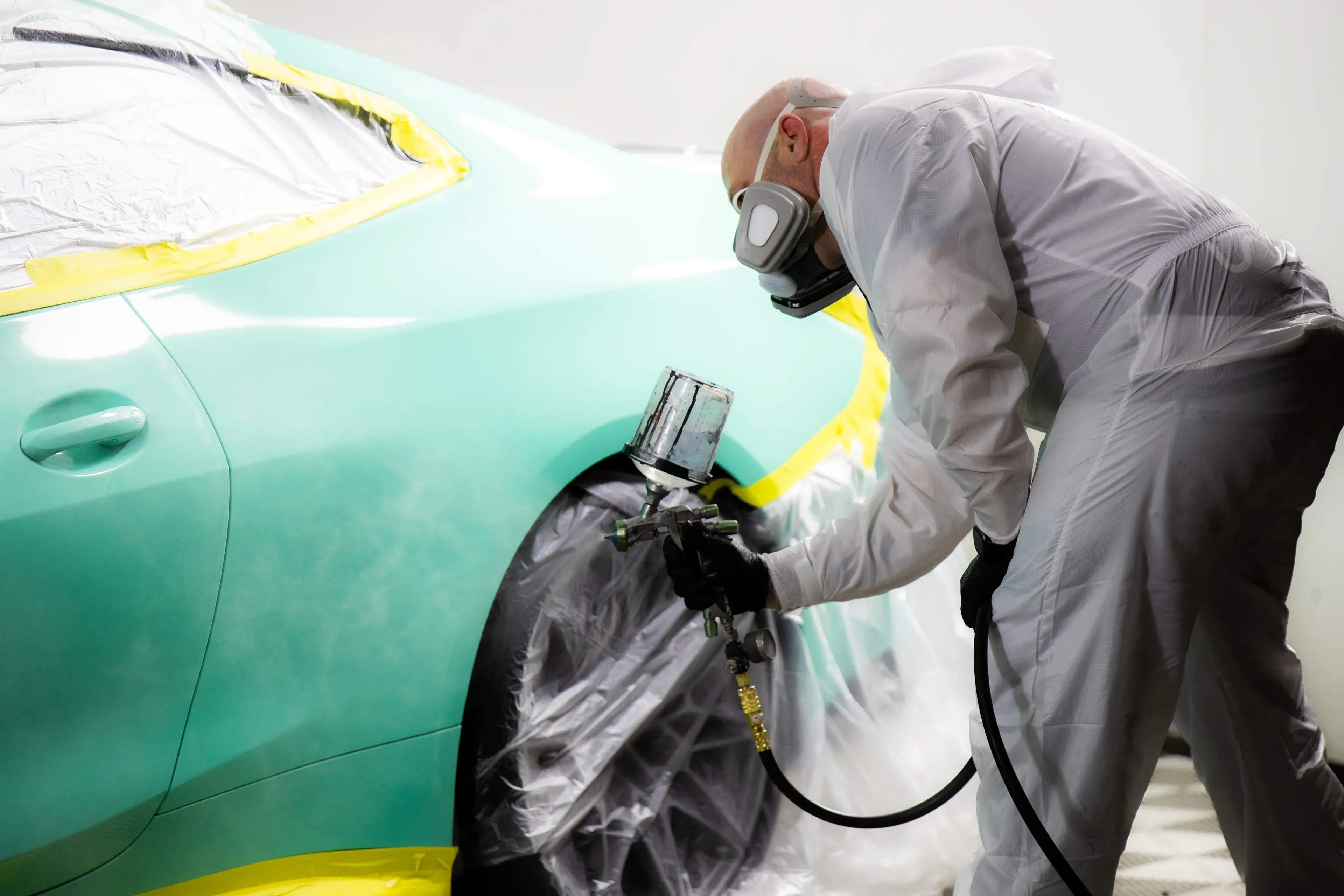 SHIELD being spray-applied inside the SkyGloss application bay